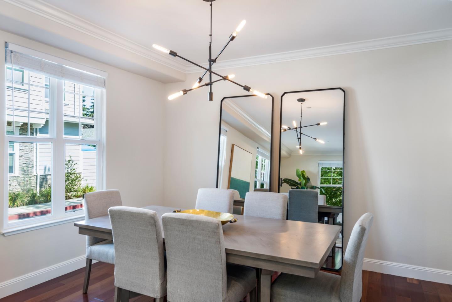 650 Willowgate Street Mountain View, CA 94043 - Photo 7 of 33 a view of a dining room with furniture window and wooden floor