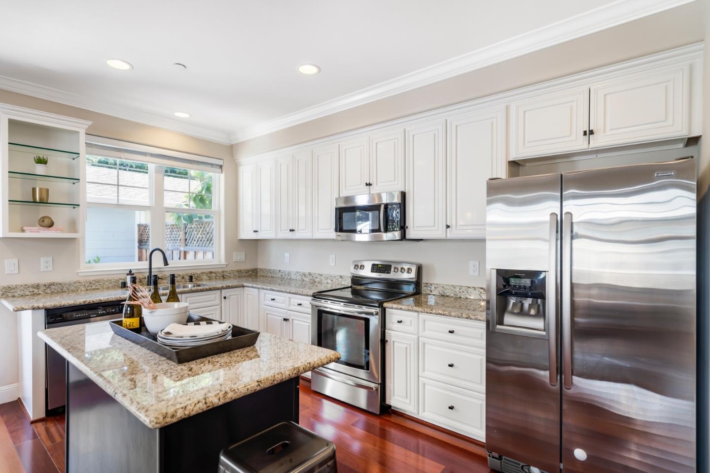 650 Willowgate Street Mountain View, CA 94043 - Photo 10 of 33 a kitchen with granite countertop a sink stove and refrigerator