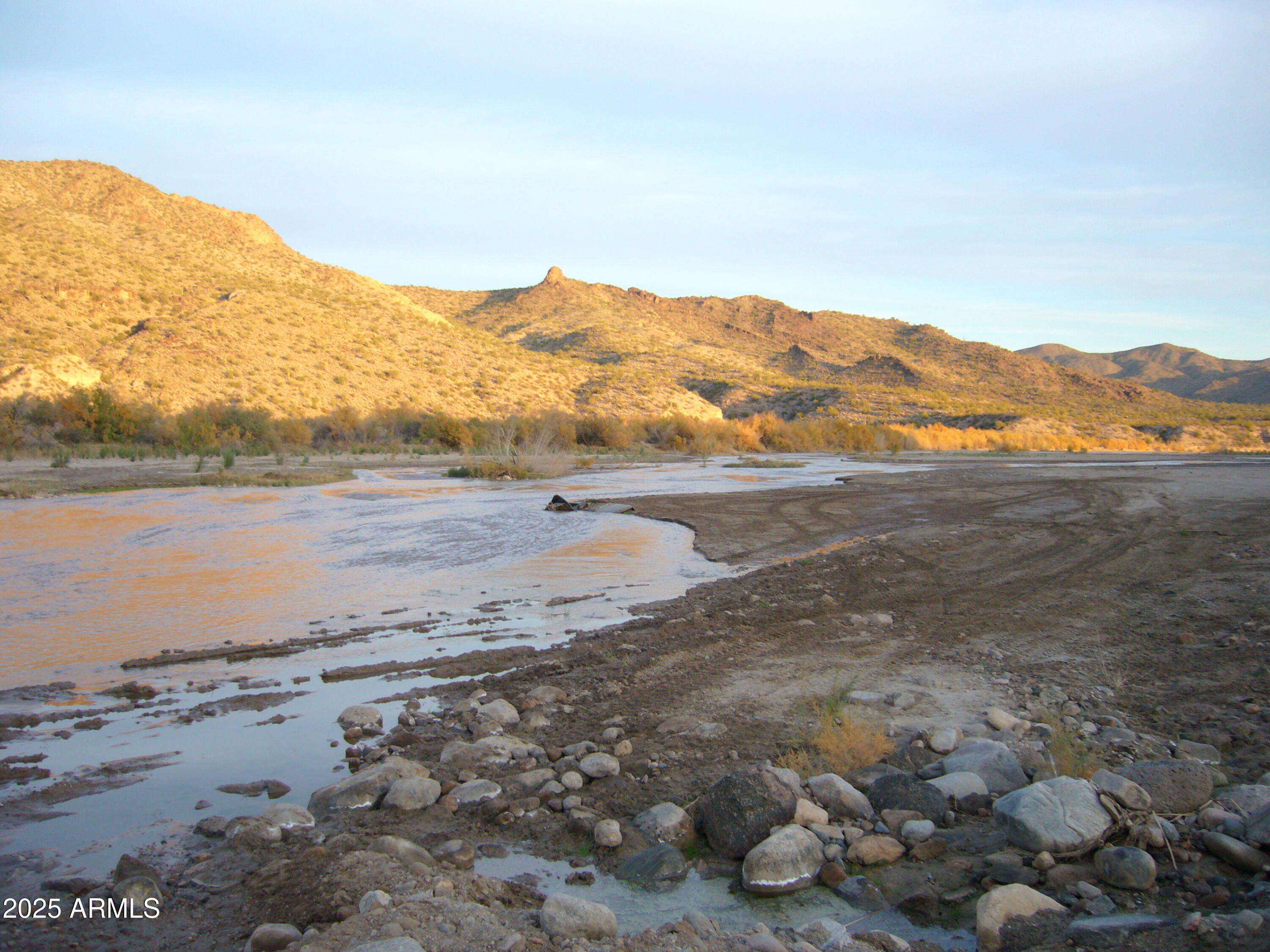 23624 Signal Road Yucca, AZ 86438 - Photo 2 of 6 a view of an ocean beach and mountain