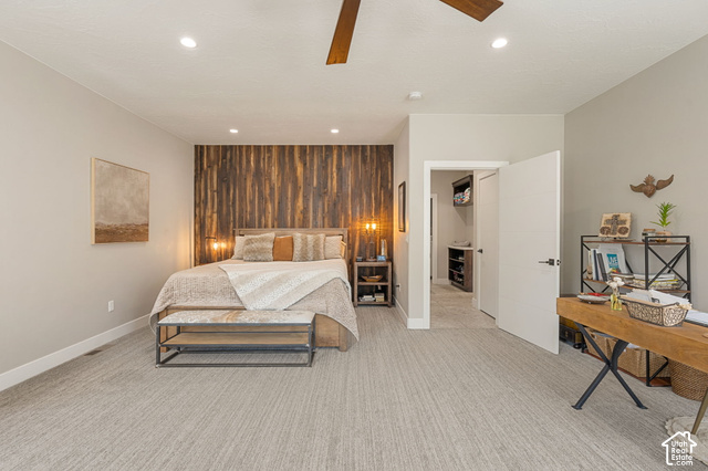 1192 East Ashdown Road Cedar City, UT 84721 - Photo 39 of 96 Recessed lighting, wood-finish ceiling fan, full accent wall with vertical wood paneling, wood-finish built-in shelving, carpet flooring