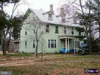 410 Pemberton Road Pemberton, NJ 08068 - Photo 1 of 1 a front view of a house with a yard