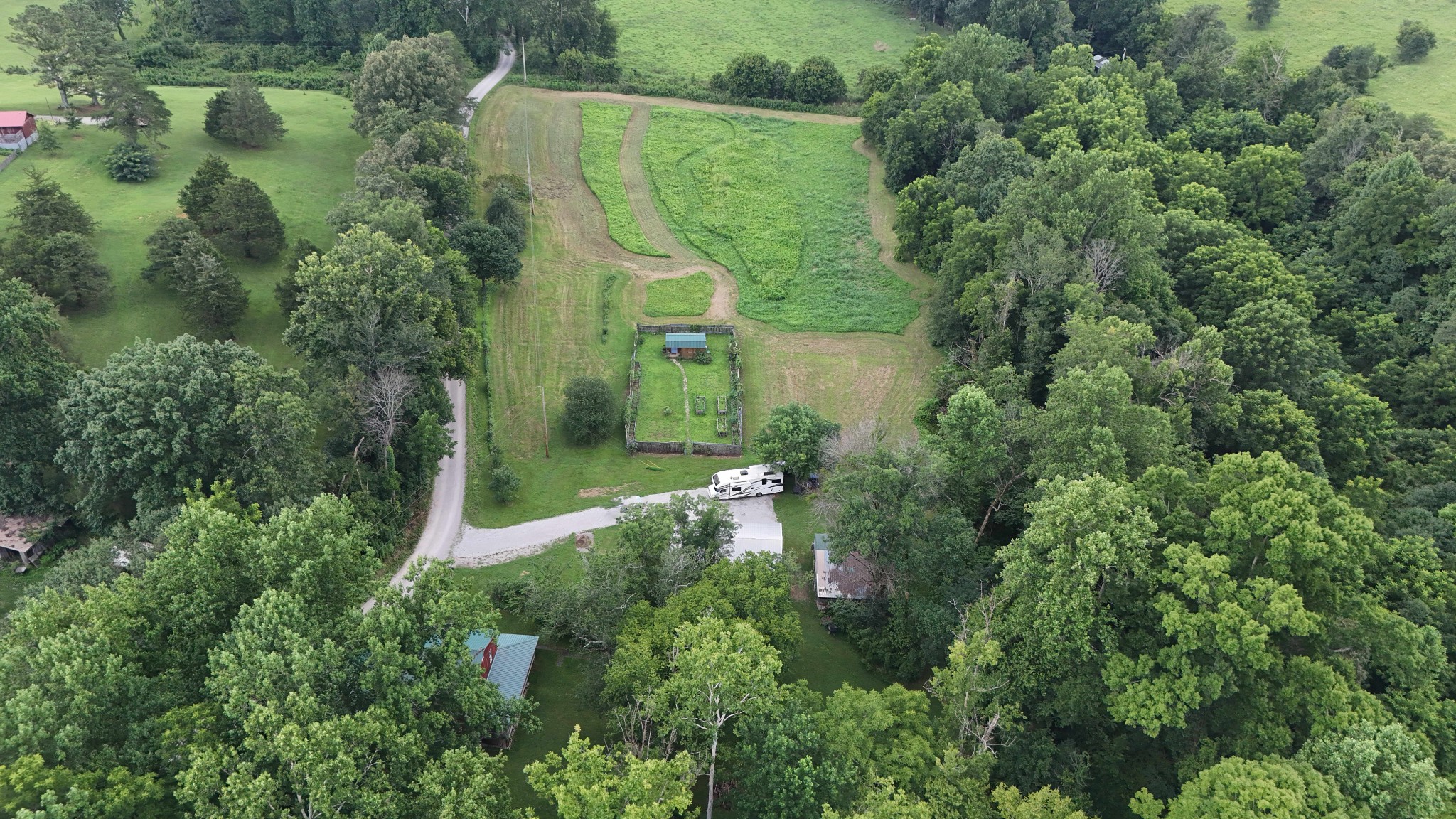 340 Christian Community Road Livingston, TN 38570 - Photo 53 of 79 an aerial view of a house with a yard