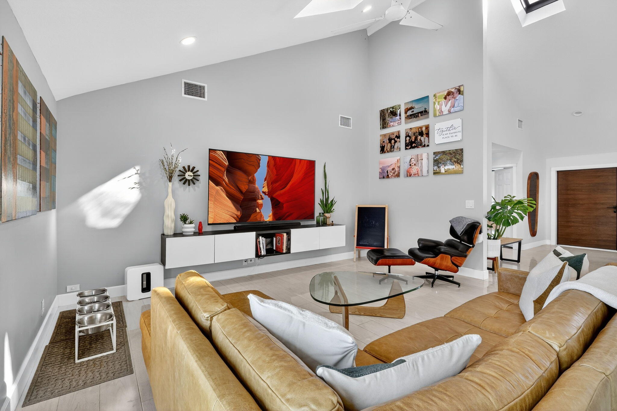 4275 Fox Trace Road Boynton Beach, FL 33436 - Photo 21 of 69 a living room with furniture workspace and a flat screen tv