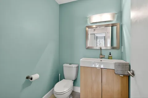 a bathroom with a sink double vanity and a mirror
