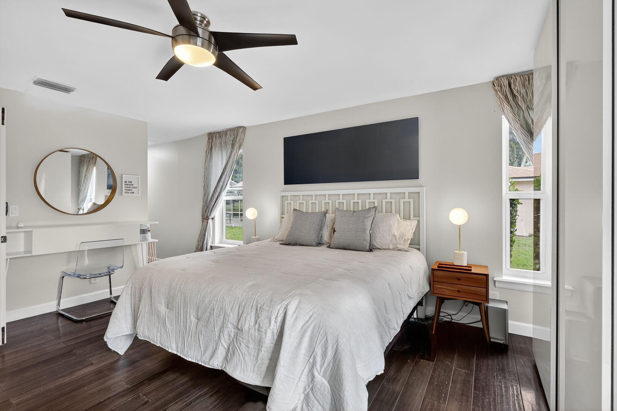 4275 Fox Trace Road Boynton Beach, FL 33436 - Photo 26 of 69 a bedroom with a bed and a flat tv screen on the dresser