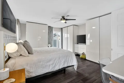 a workspace with furniture and wooden floor