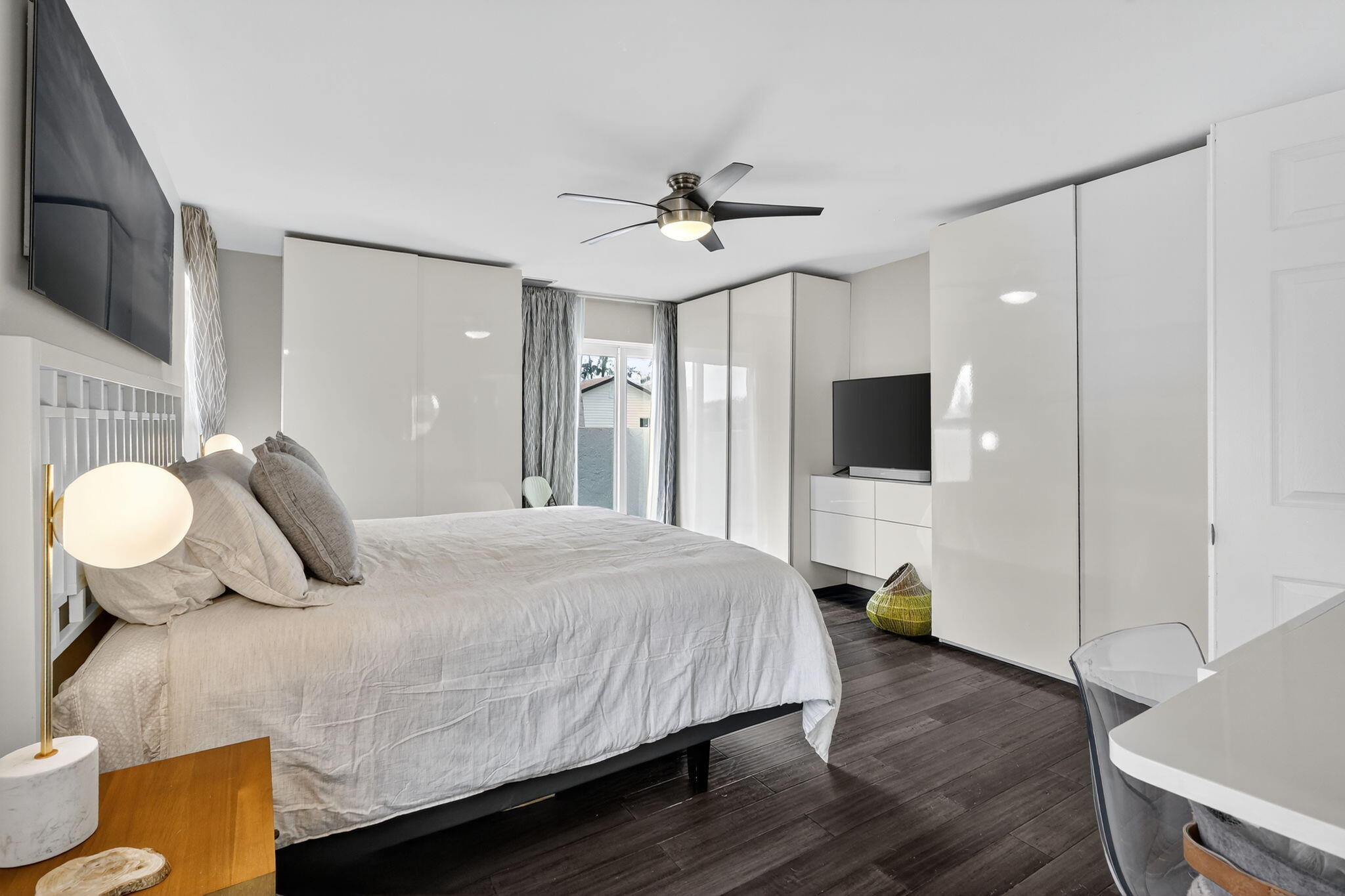 4275 Fox Trace Road Boynton Beach, FL 33436 - Photo 27 of 69 a bedroom with a bed and a flat screen tv