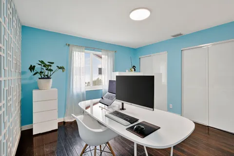 a living room with furniture and window