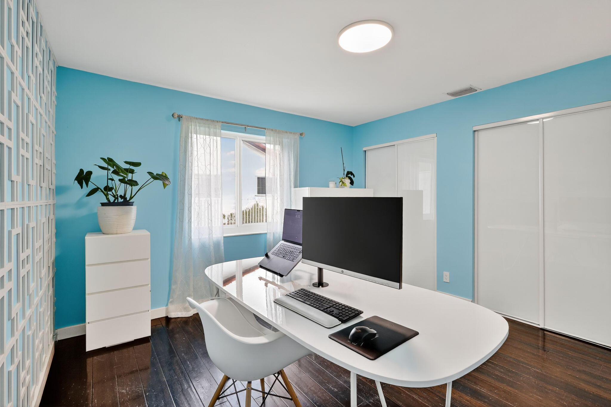 4275 Fox Trace Road Boynton Beach, FL 33436 - Photo 37 of 69 a view of a workspace with furniture and wooden floor