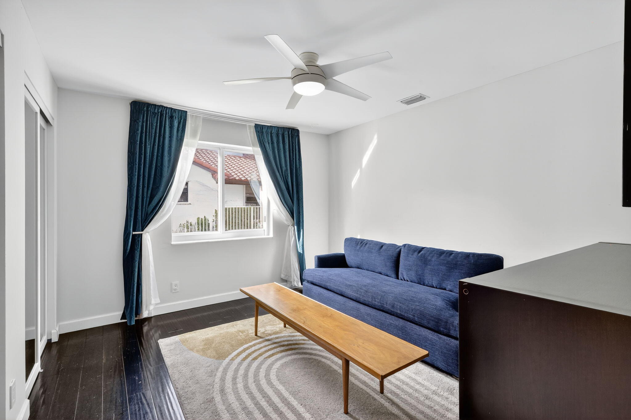 4275 Fox Trace Road Boynton Beach, FL 33436 - Photo 41 of 69 a living room with a couch and a window