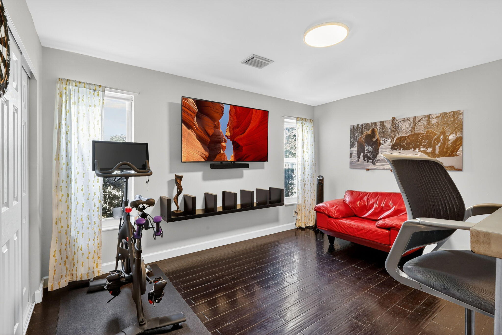 4275 Fox Trace Road Boynton Beach, FL 33436 - Photo 45 of 69 a living room with furniture and a flat screen tv