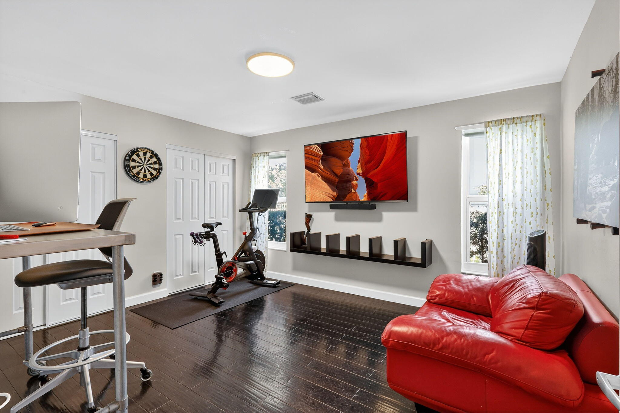 4275 Fox Trace Road Boynton Beach, FL 33436 - Photo 46 of 69 a living room with furniture flat screen tv and window