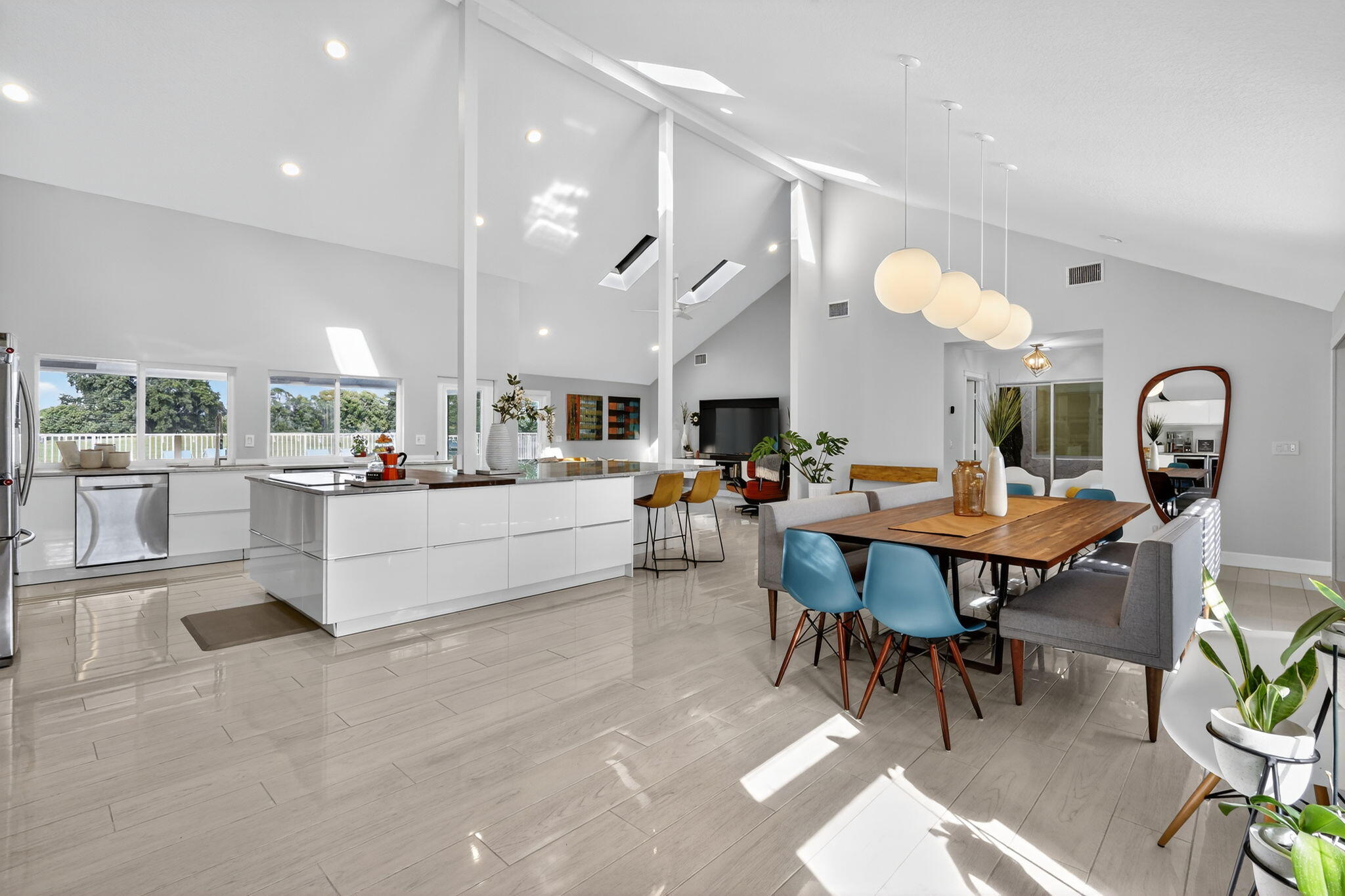 4275 Fox Trace Road Boynton Beach, FL 33436 - Photo 5 of 69 a living room with furniture and a view of kitchen