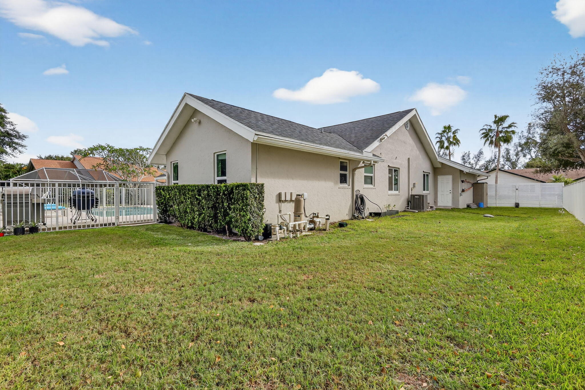4275 Fox Trace Road Boynton Beach, FL 33436 - Photo 58 of 69 a view of a house with backyard and garden