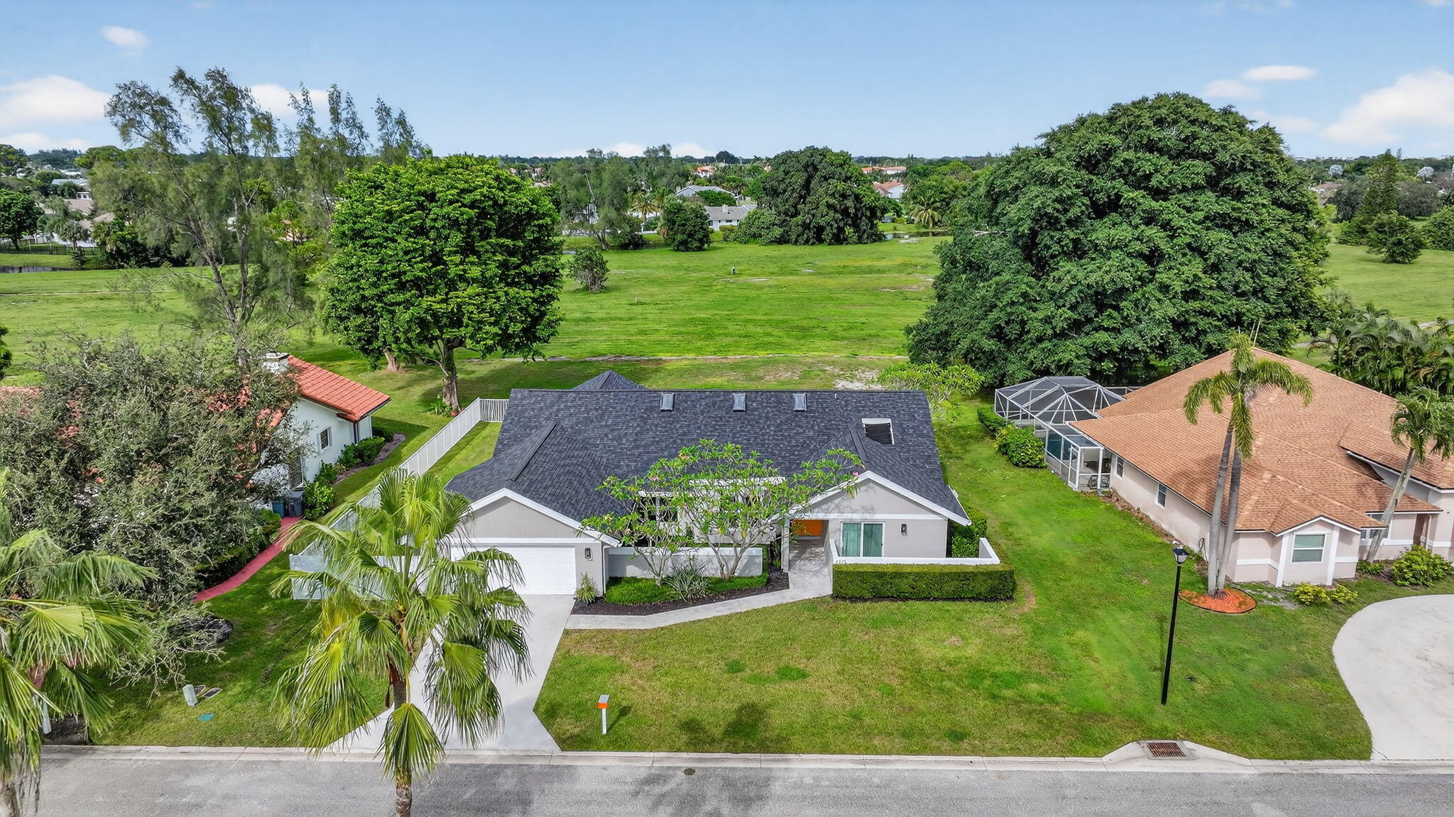 4275 Fox Trace Road Boynton Beach, FL 33436 - Photo 69 of 69 an aerial view of a house