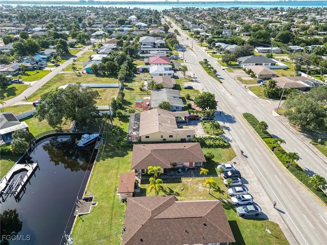 an aerial view of a city with lots of residential buildings