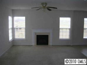 6324 Trotters Ridge Road Charlotte, NC 28227 - Photo 2 of 8 a view of an empty room with a window