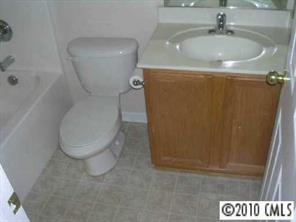 6324 Trotters Ridge Road Charlotte, NC 28227 - Photo 7 of 8 a bathroom with a toilet and a sink
