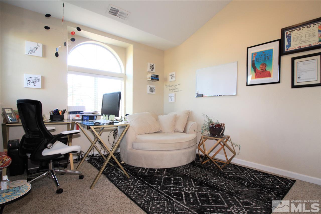 470 Len Circle Reno, NV 89511 - Photo 18 of 24 a living room with furniture and a window