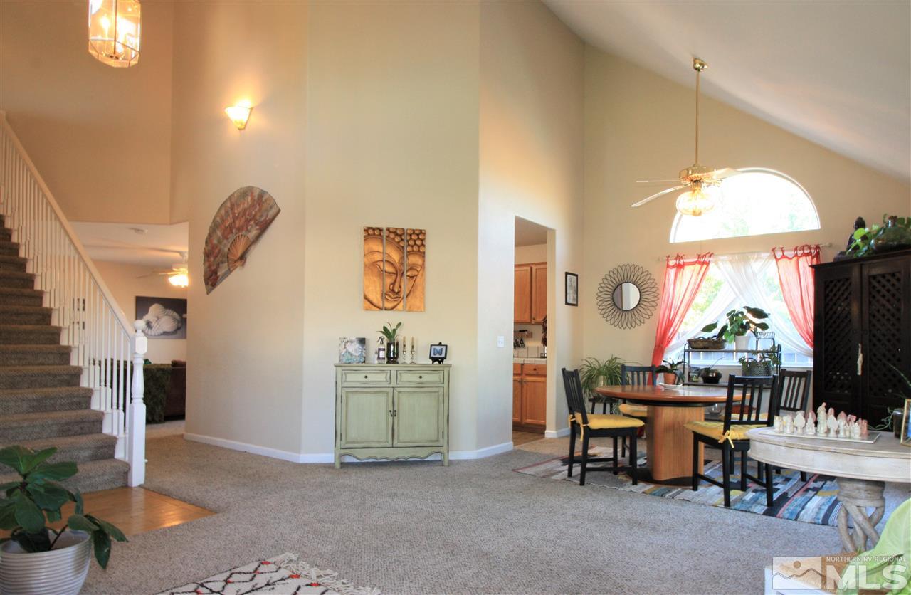 470 Len Circle Reno, NV 89511 - Photo 2 of 24 a living room with furniture and a large window