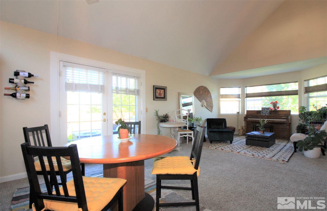 470 Len Circle Reno, NV 89511 - Photo 4 of 24 a view of a dining room with furniture and window