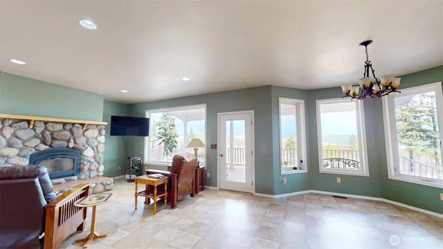 a view of a hallway with windows