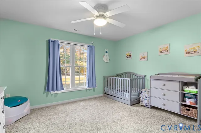 a view of livingroom with furniture and window