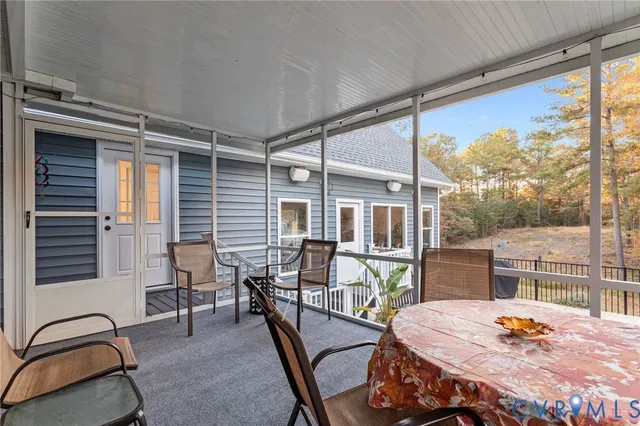a balcony with furniture and outdoor view