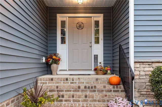 a front view of a house with a backyard