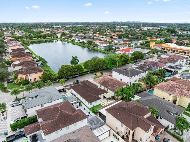 an aerial view of a house with a garden