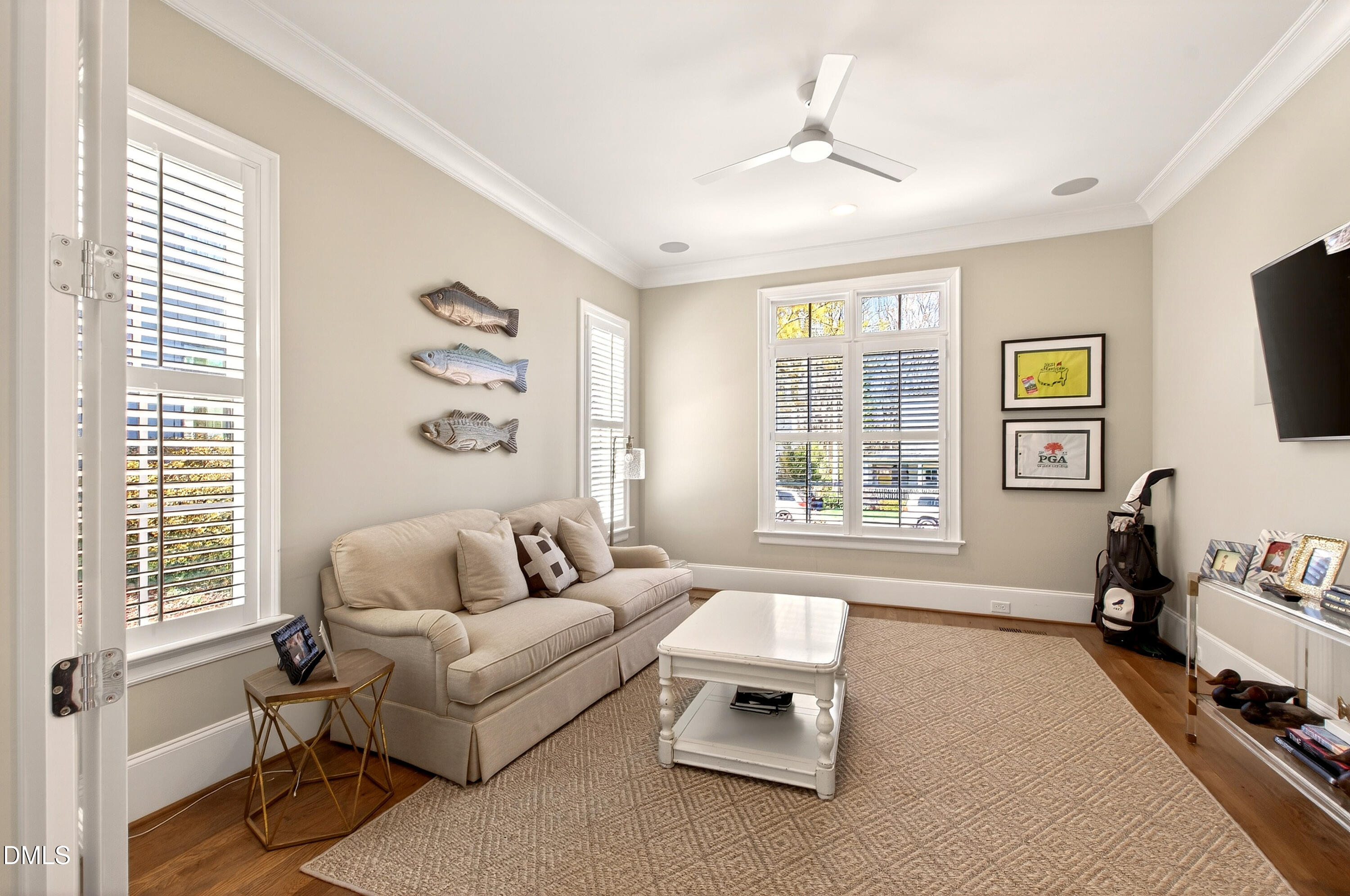 2820 Claremont Road Raleigh, NC 27608 - Photo 26 of 60 Downstairs flex space, TV room or study with built-in surround sound.