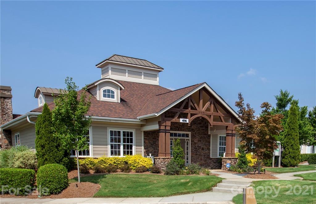 463 Hunters Dance Road, Unit 342 Fort Mill, SC 29708 - Photo 15 of 17 a front view of a house with garden