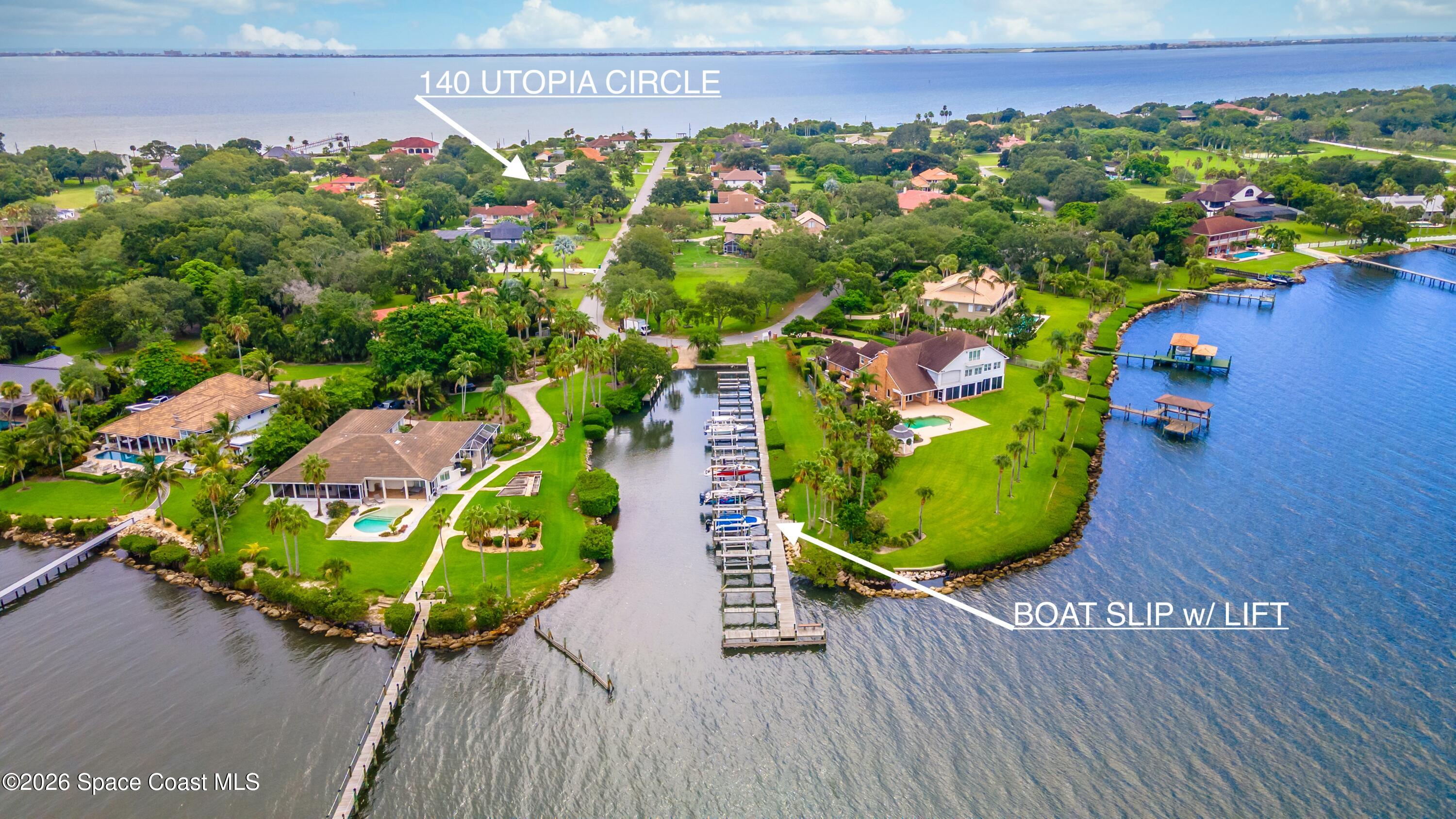 140 Utopia Circle Merritt Island, FL 32952 - Photo 2 of 54 a view of a wooden bridge