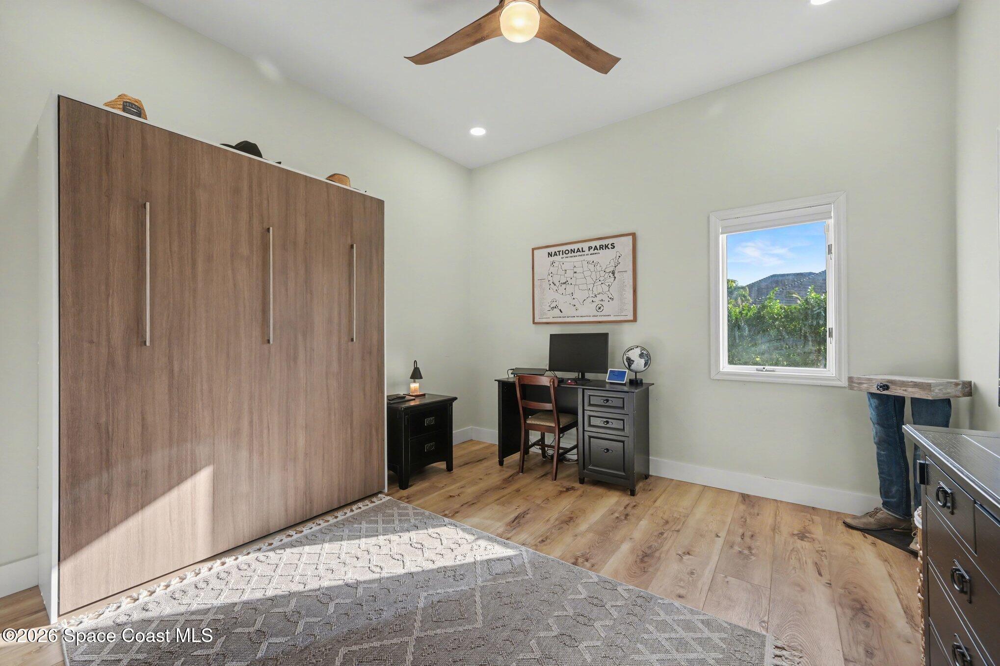 140 Utopia Circle Merritt Island, FL 32952 - Photo 30 of 55 a view of room with window and furniture
