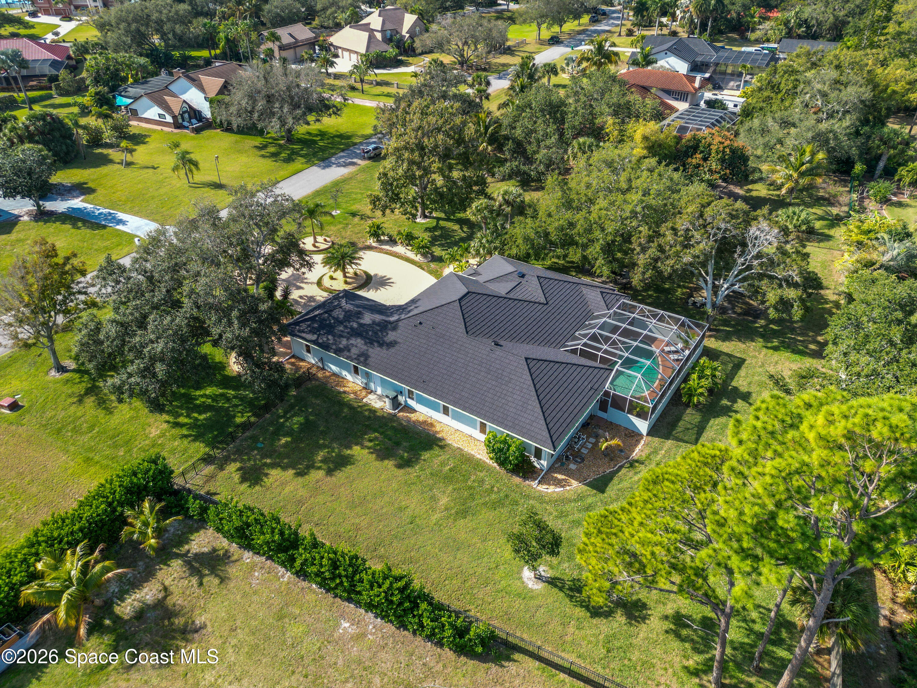 140 Utopia Circle Merritt Island, FL 32952 - Photo 46 of 55 an aerial view of residential house with outdoor space and swimming pool