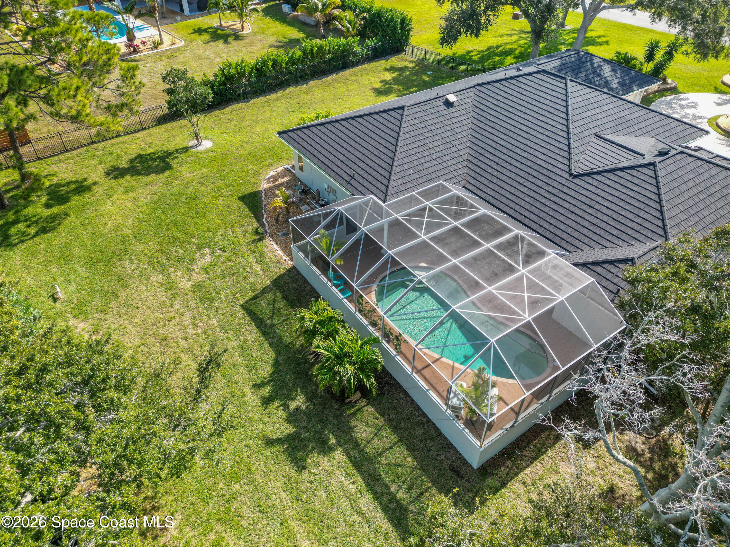 140 Utopia Circle Merritt Island, FL 32952 - Photo 48 of 55 a view of a backyard with sitting area