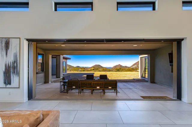 a bathroom with a granite countertop sink a mirror and a