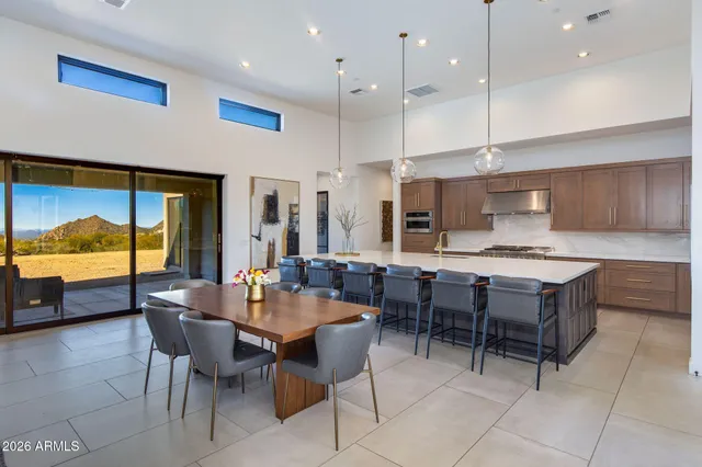 a bedroom with a bed dresser and a window