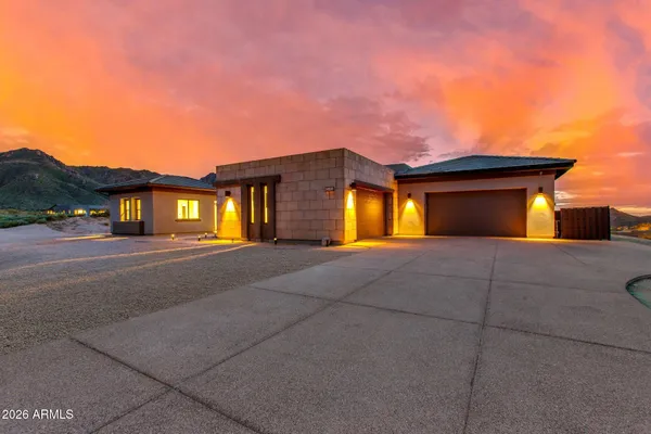 a view of a house with a garage