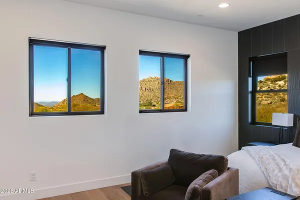 a bathroom with a granite countertop sink a mirror and a