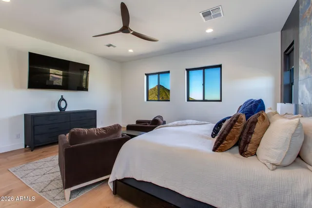 a view of a swimming pool with an outdoor seating