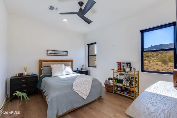 a view of a dining table and chairs in the patio