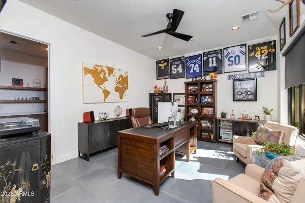 a view of swimming pool with outdoor seating and plants