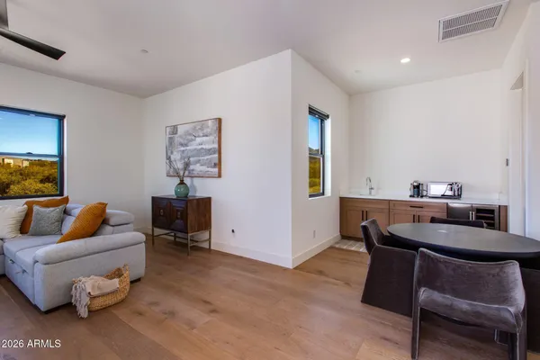 a view of swimming pool with a garden and seating area