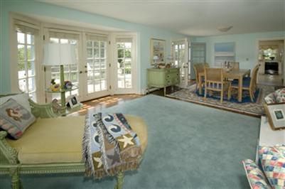 61 Shore Road Chatham, MA 02633 - Photo 11 of 28 a bedroom with furniture and a large window