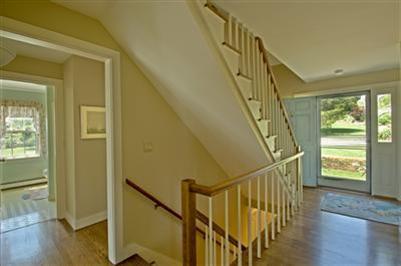 61 Shore Road Chatham, MA 02633 - Photo 14 of 28 a view of entryway with wooden floor and stairs