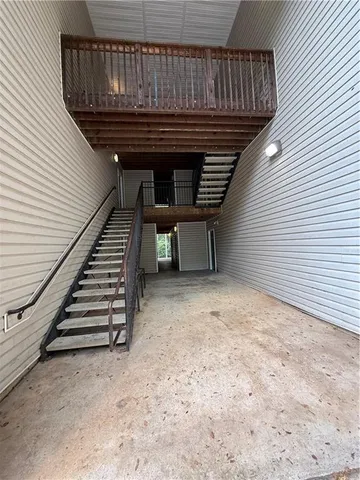 a view of entryway with wooden floor