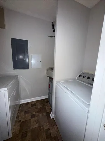 a storage room with washer and dryer