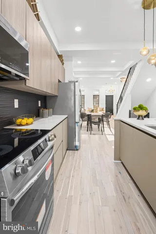 a view of a livingroom with furniture and entryway
