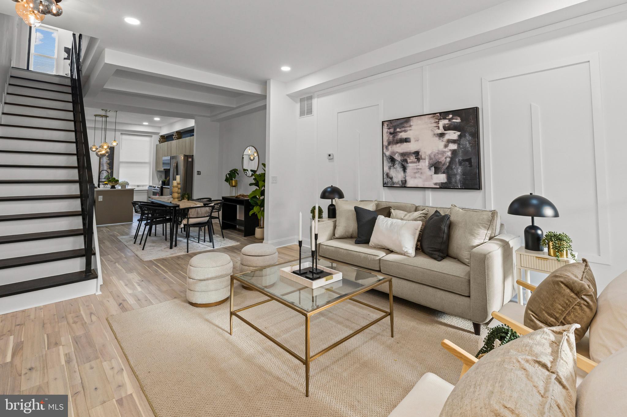2321 Madison Avenue Baltimore, MD 21217 - Photo 2 of 55 a living room with furniture and wooden floor